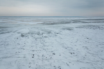 Landscape with river covered ice and snow