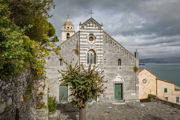 Fototapeta premium Cityscape. View of facade of San Lorenzo Church, Portovenere, La Spezia, Liguria, Italy of Porto Venere town, Liguria, Italy.