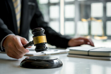 Attorneys or judges use the president's gavel to judge justice matters at law firms, legal concepts and legal services.