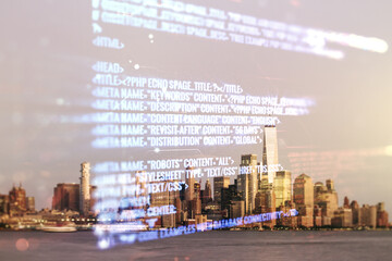 Double exposure of abstract programming language interface on New York city skyscrapers background, research and development concept