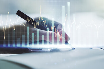 Abstract creative financial graph with hand writing in diary on background, financial and trading...