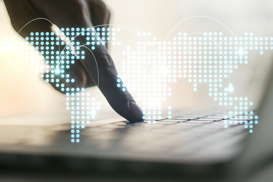 Abstract creative world map with connections and hands typing on laptop on background, international trading concept. Multiexposure - Powered by Adobe