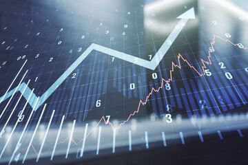 Abstract virtual financial graph and upward arrow hologram on blurry contemporary office building background, financial and trading concept. Multiexposure