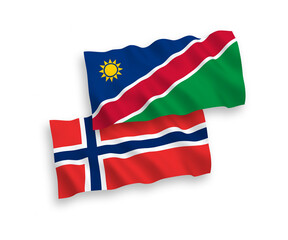 National vector fabric wave flags of Norway and Republic of Namibia isolated on white background. 1 to 2 proportion.