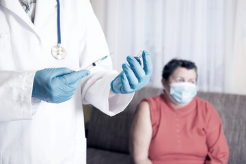 Elderly woman getting coronavirus vaccine