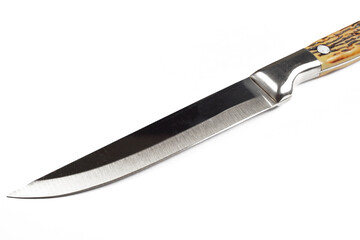 new kitchen knife on a white background, isolate, close-up.