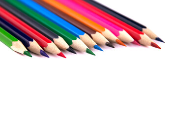 Drawing supplies: many different colored pencils.