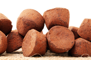 chocolate truffles on white background