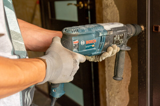 Dolyna, Ukraine July 21, 2020: installation and fixing of entrance doors, new doors with polymer coating.