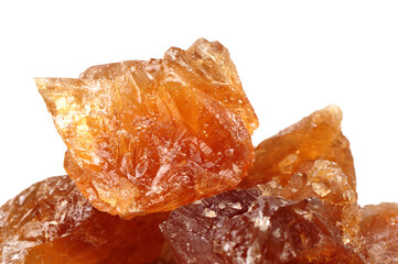 dark crystal sugar on white background