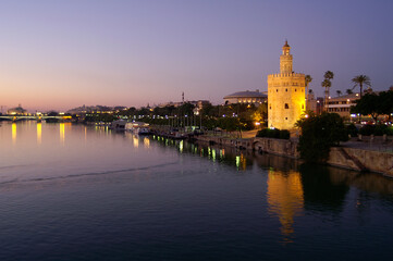 Seville (Spain). Torre del Oro next to the Guadalquivir river in the city of Seville