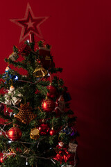 Fototapeta na wymiar Near Christmas tree decorations. texture to the background. New year concept.
