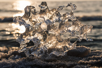 Ice sculptures on a seashore in winter time