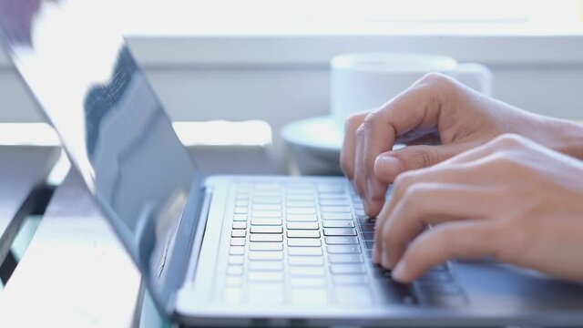 Business women are working at home using laptop computers in a severe coronavirus situation.