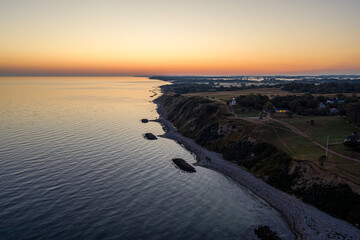 Fototapeta premium Spodsbjerg Lighthouse and Coastline during Sunrise
