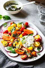 Burrata with colorful Cherry Tomatoes Salad with Pesto