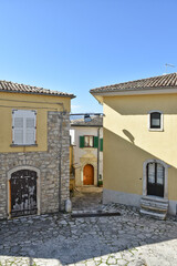 A street among the old stone houses of Paternopoli, a medieval village in the province of Avellino.