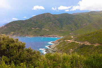 Fototapeta premium Panorama view of the rocky coastline of corsican Cap Corse near Erbalunga, Corsica, France. Tourism and vacations concept.