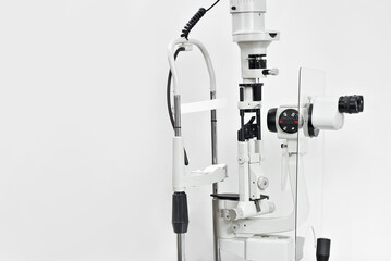 Apparatus for checking vision on a white wall background. Ophthalmology equipment isolated on a white background.