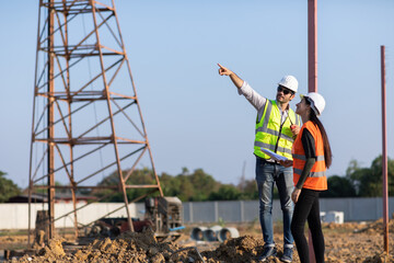 Professional Mechanical Engineer teamwokr. Construction manager and engineer working on construction building site. construction engineer driving