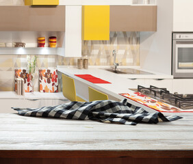 Napkin on wooden desk perspective. Kitchen background.