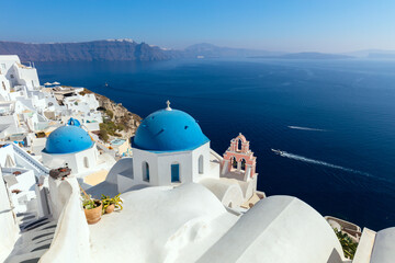 Fototapeta premium Panoramic view of Oia town cityscape at Santorini island in Greece
