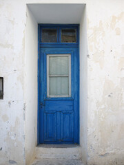 Fototapeta na wymiar Old traditional wooden door in the village of Mesotopos, in Lesvos (Lesbos) island, Aegean sea, Greece, Europe.