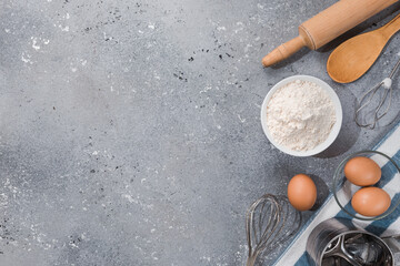 Set of kitchen utensils with products on gray-blue background. Cooking master classes. Copy space.