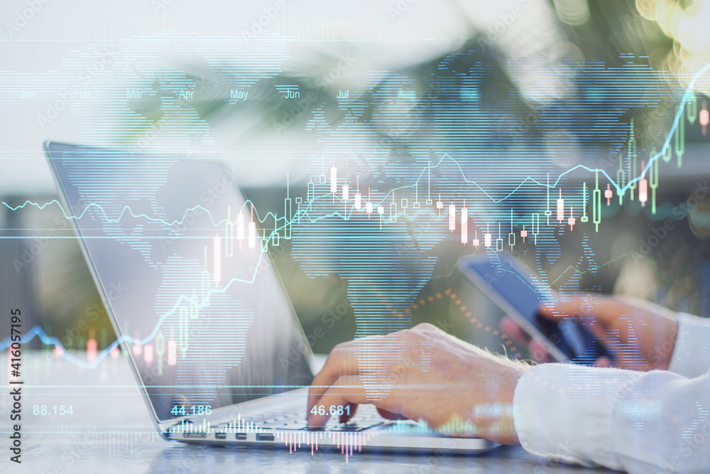 Poster online investment concept: digital screen with stock market diagram and graphs and man using laptop 