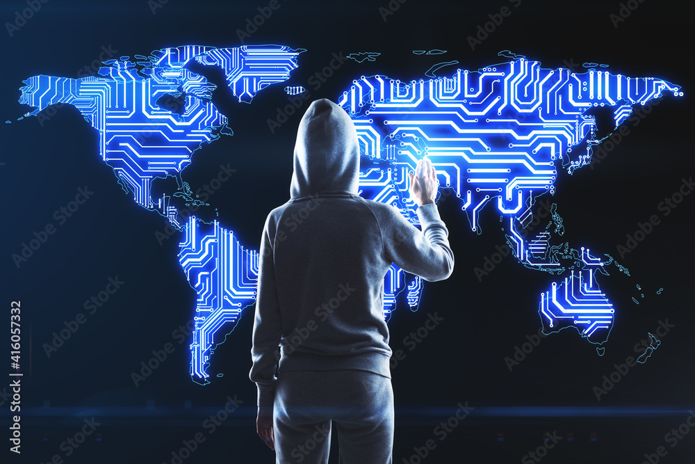 Poster World internet security concept with hacker back touching digital screen with microchip world map at dark background