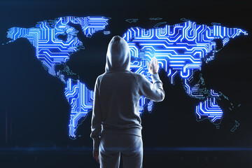 World internet security concept with hacker back touching digital screen with microchip world map at dark background