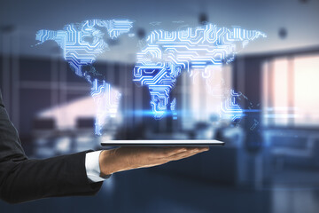 Big data business with digital microchip world map scheme above businessman hand with digital tablet at office background