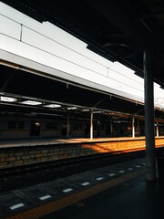 The train station in Jakarta, Indonesian, I'm waiting for the train to come so I can travel, not many people, because covid 19 is still hanging around.