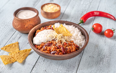 Chili con carne served with white rice