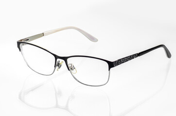 glasses on a white background with reflection