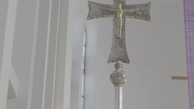 Close-up of a cross in the sanctuary of a church