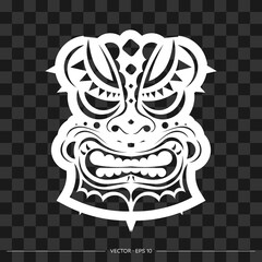Totem in the shape of a face made of patterns. The contour of the face or mask of a warrior. For T-shirts and prints. Vector illustration.