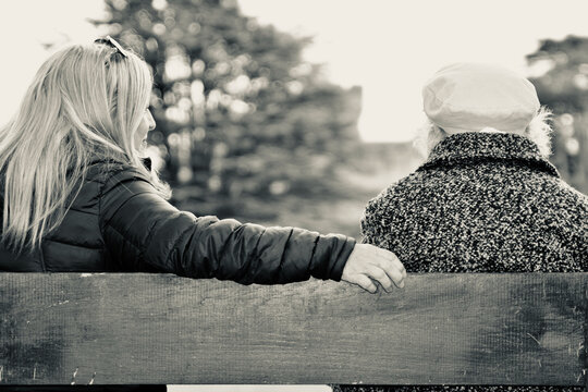 An Elderly, 90 Year Old Woman Enjoys Time With Her Daughter In A Local Park. Her Dementia And Health Issues Mean That She Has Had Few Such Opportunities Whilst Shielding During Lockdown. 