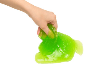 Green slime toy in woman hand isolated on white background.