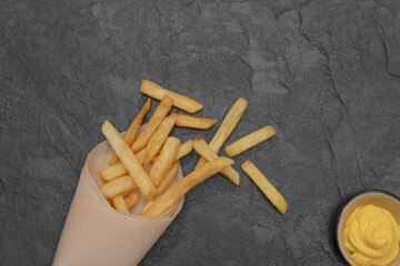 French fries and cheese sauce, background