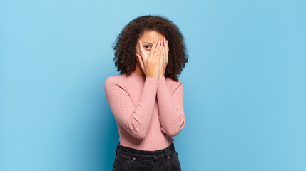  feeling scared or embarrassed, peeking or spying with eyes half-covered with hands