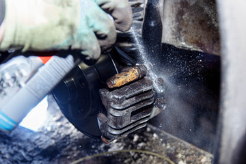 Lubricating the brake caliper with a spray can