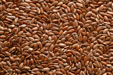 flax seeds isolated on a white background, top view