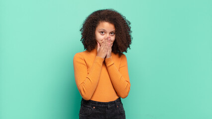  happy and excited, surprised and amazed covering mouth with hands, giggling with a cute expression