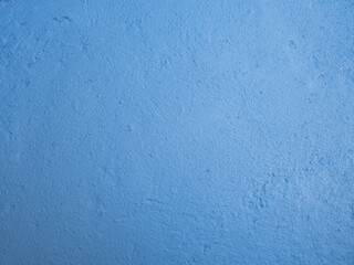 Blue painted cement wall, brush paint concrete wall texture, decorative rustic coatingbackground