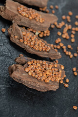 Brown kidney beans isolated on a dark background