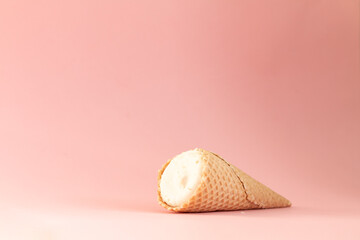 ice cream cone isolated on pink background, sweet summer food concept