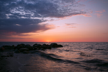 romantic seashore sunset with dramatic sky, wallpaper