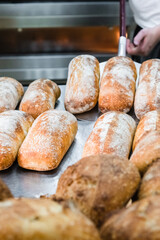 Craft bread on the table at the bakery. The concept of small industries and healthy food
