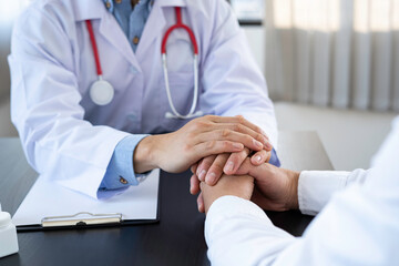The doctor or pharmacist is discussing and encouraging the results of the treatment. With the patients who were examined, counseling ideas and treatment guidelines